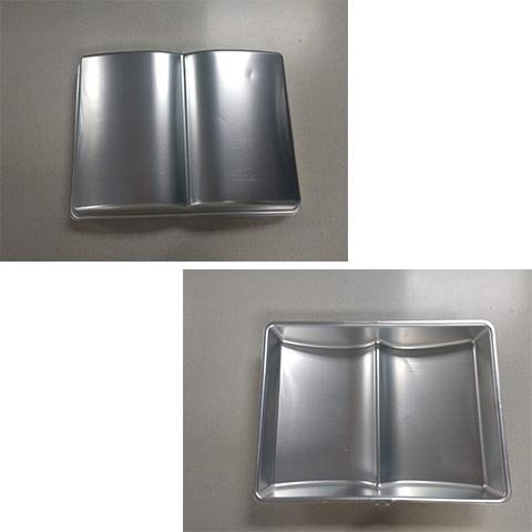 Front and back view of the 3D book cake pan